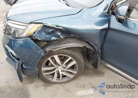 2017 Honda Pilot Touring z USA, uszkodzony, nr VIN 5FNYF6H95HB081128